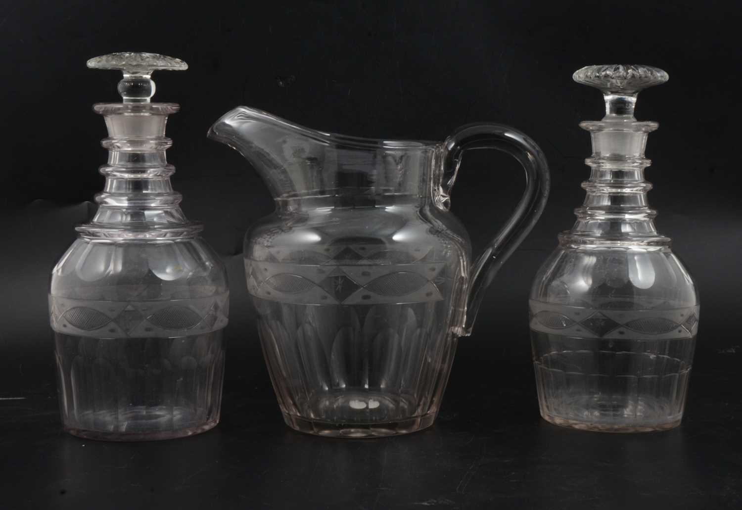 Lot 4 - Two Regency glass decanters and a jug