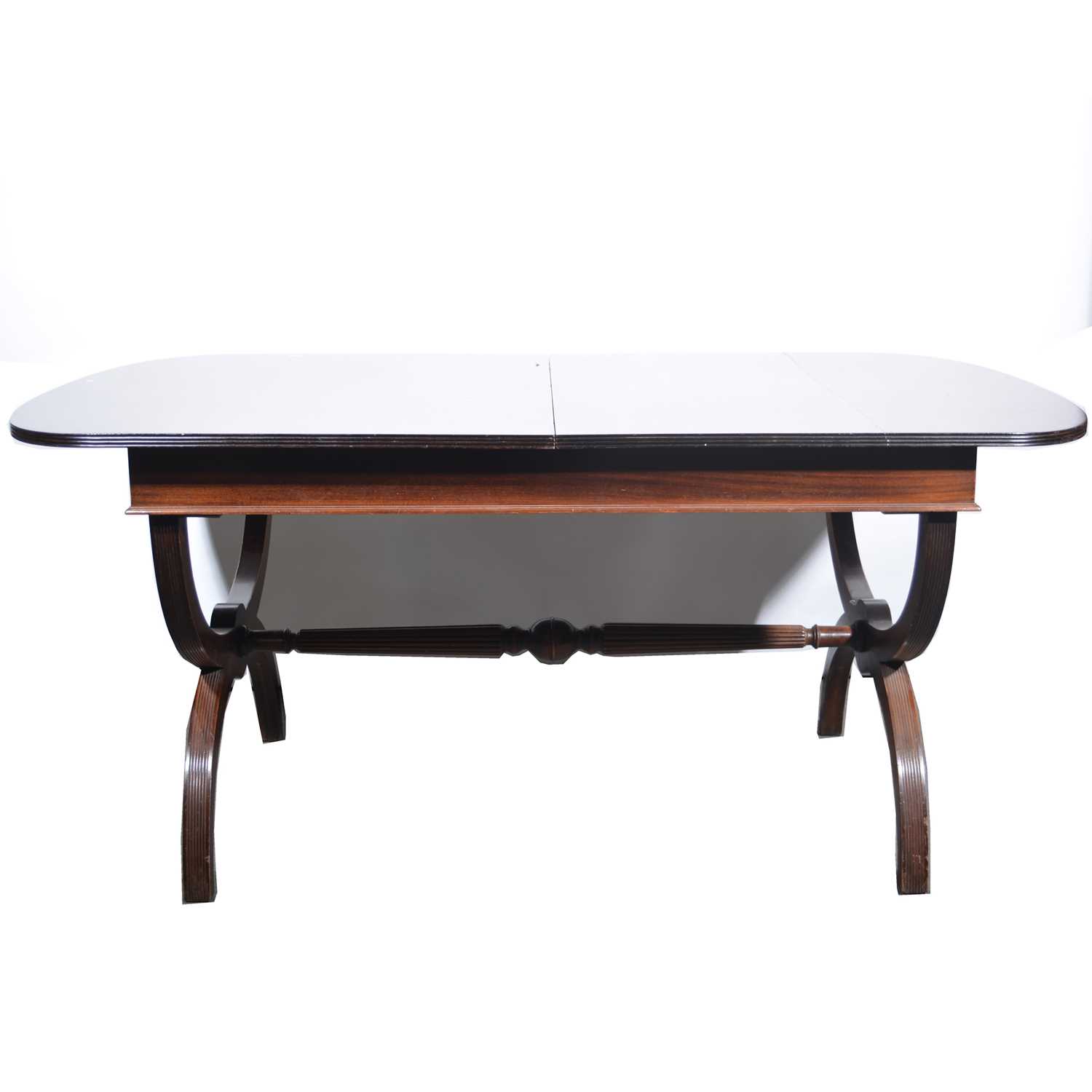 Lot 606 Mahogany extending dining table.