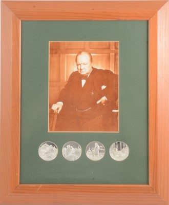 Lot 87 - Churchill interest: a framed sepia photograph with four medals, probably plated.