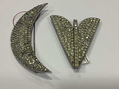 Lot 236 - Twelve large Art Deco paste set dress clips.
