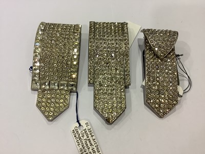 Lot 236 - Twelve large Art Deco paste set dress clips.