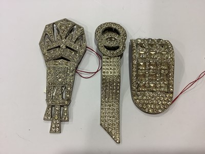 Lot 236 - Twelve large Art Deco paste set dress clips.