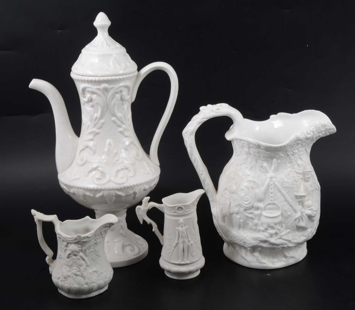 Lot 21 - A Samuel Alcock & Co white stoneware jug, plus other white pottery items.