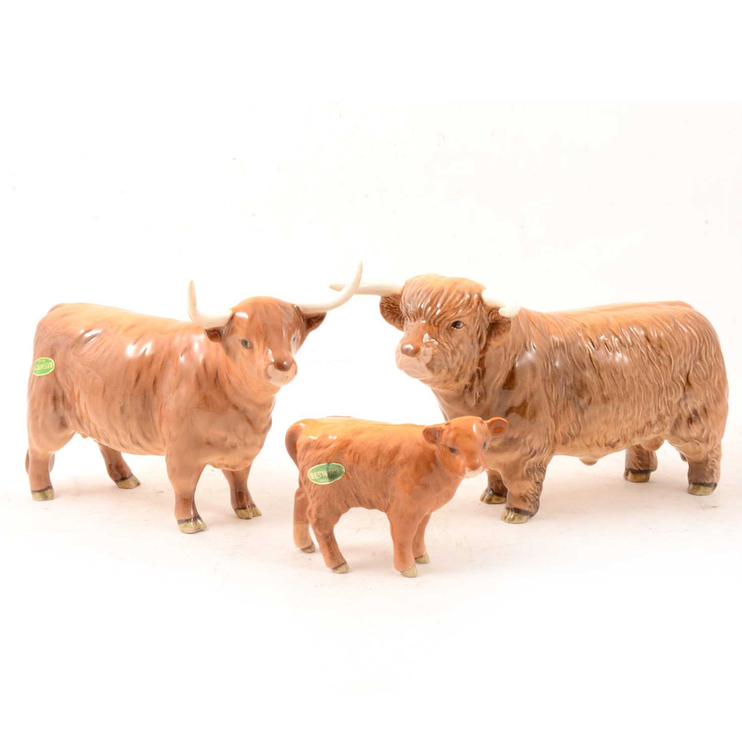 Lot 5 - A Beswick Highland Bull, Cow and Calf models.