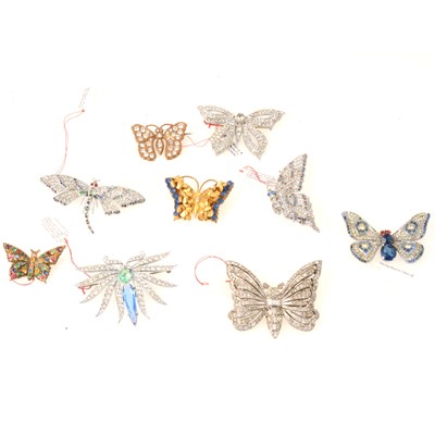 Lot 283 - Nine 1930's coloured and clear paste butterfly brooches.