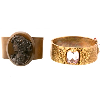 Lot 267 - Victorian style half hinged bangle and an early celluloid cameo mourning bangle.