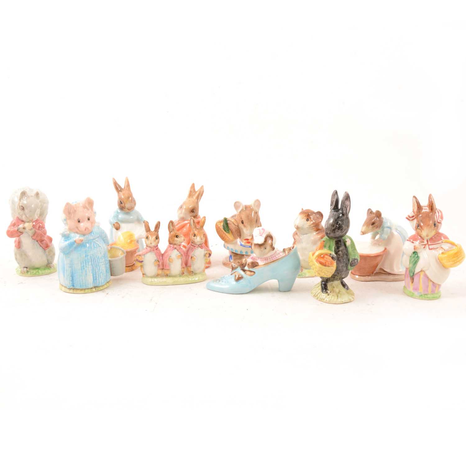 Lot 11 - A small collection of Beswick Beatrix Potter models.