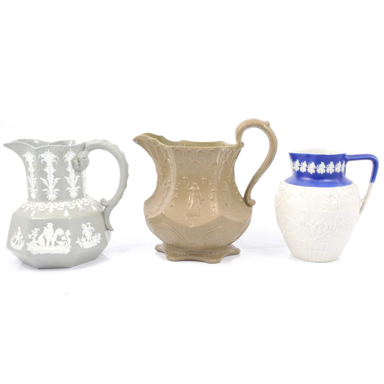 Lot 47 - Stoneware Gothic jug a Hunt jug and an 'Oriental' jug