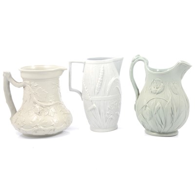 Lot 49 - Stoneware Society of Arts jug, Harvest Barrel jug and a Tulip jug