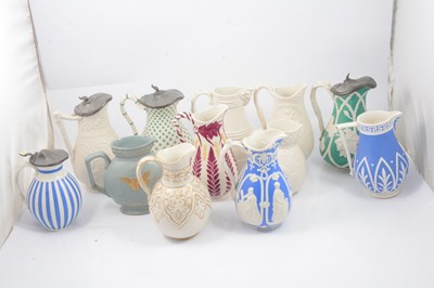 Lot 66 - Stoneware Ivy jug and eleven other jugs