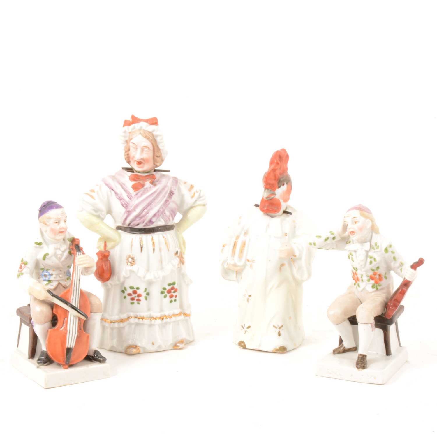 Lot 33 - Pair of German porcelain musicians, and two nodding head figures.