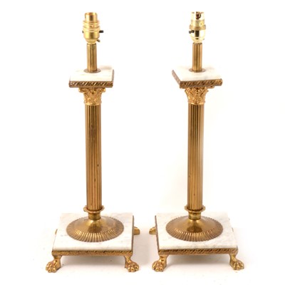 Lot 243 - Pair of brass and marble Corinthian table lamps.