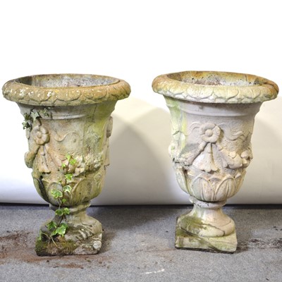 Lot 229 - Pair of reconstituted stone pedestal garden urns, floral and fruit swag bowls.