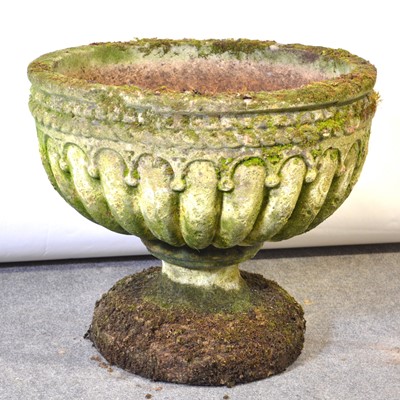 Lot 231 - A circular garden urn, fluted bowl, circular base.