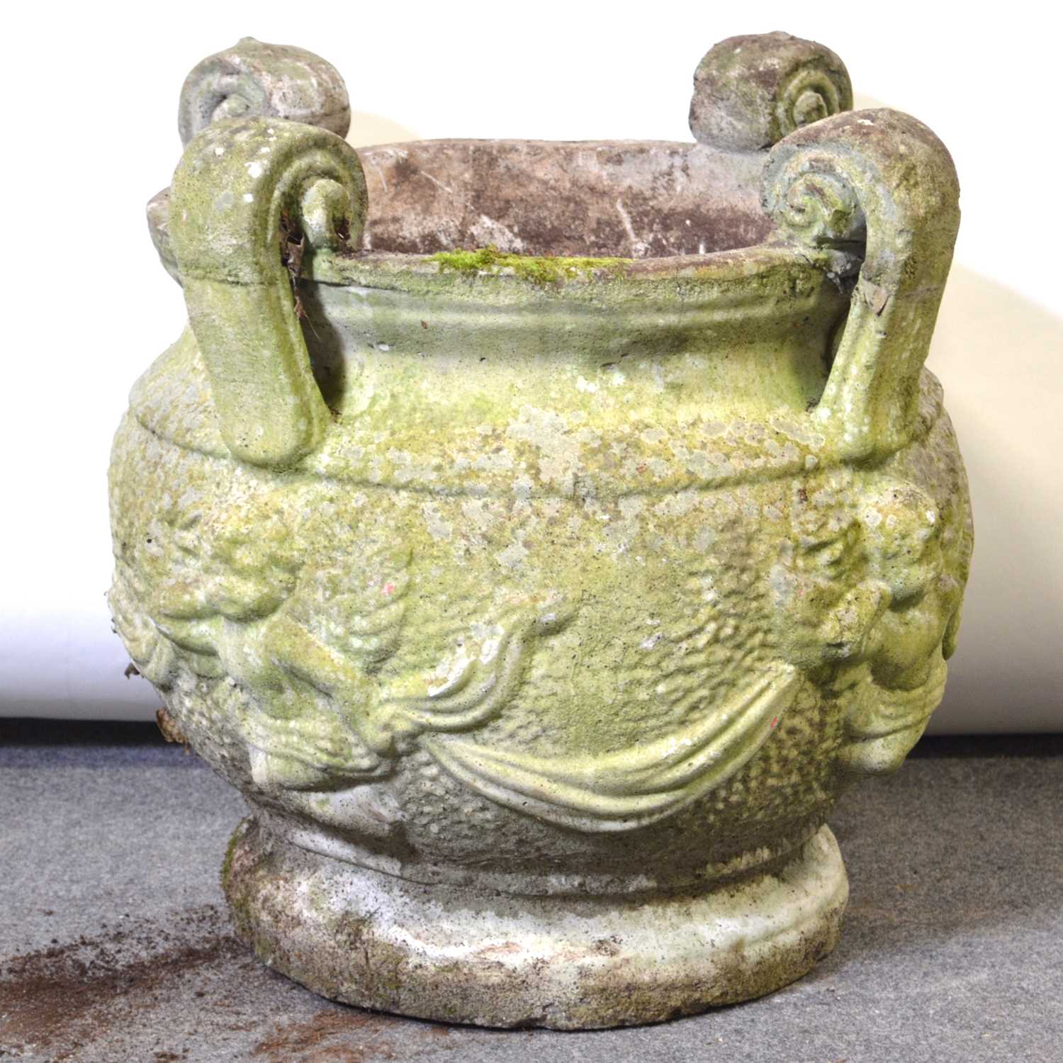 Lot 228 - A circular garden urn, cherub bowl.