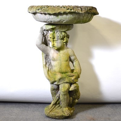 Lot 225 - A reconstituted stone cherub bird bath (bowl cracked).