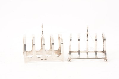 Lot 382 - Silver toast racks, Viner's Ltd, Sheffield 1933, and James Dixon & Sons Ltd, Sheffield 1909.