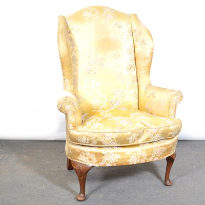 Lot 515 - George II style wing-back easy chair