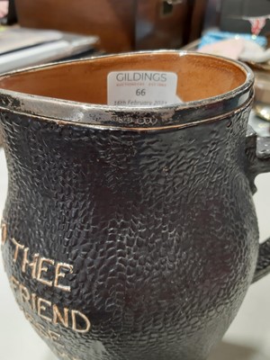 Lot 66 - Large Doulton Lambeth Slater's patent stoneware 'black jack' jug, silver mounted.