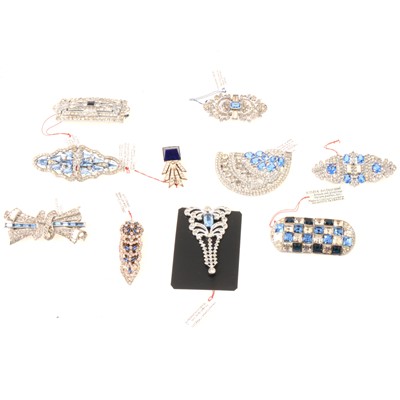 Lot 275 - Ten vintage blue and white paste dress clips and brooches.