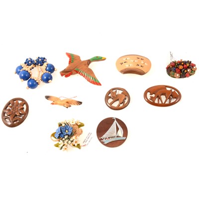 Lot 270 - Ten vintage wooden brooches, racehorses, Bambi, mallard, yacht.