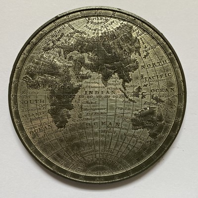 Lot 110 - White metal medallion, "Map of the World"