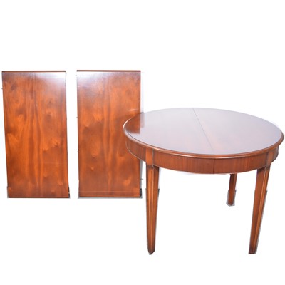 Lot 513 - Contemporary mahogany extending dining table.