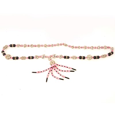 Lot 303 - 1920's sautoir necklace of clear paste, pink and black glass beads.