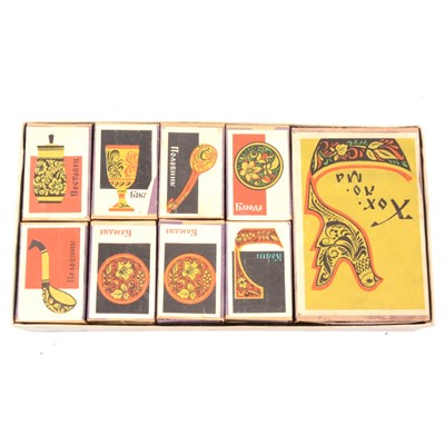 Lot 183 - Vintage Russian matchboxes, carpet beater and modern red leather boxes.