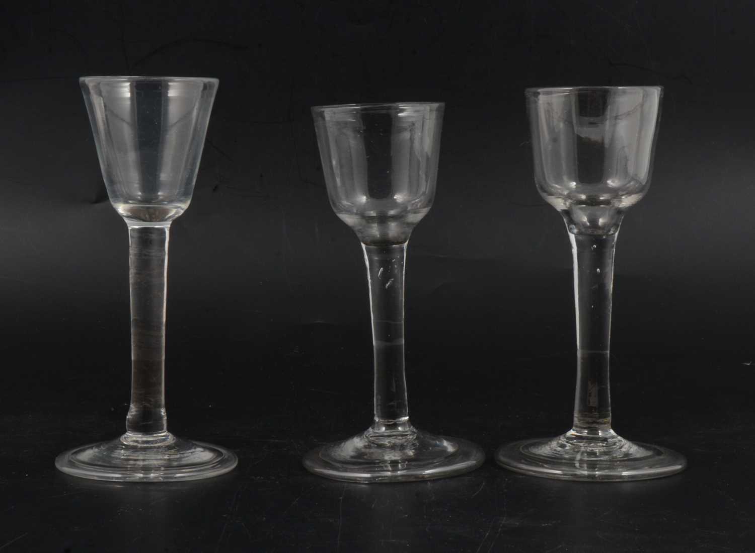 Lot 11 - Two similar wine glasses, and another