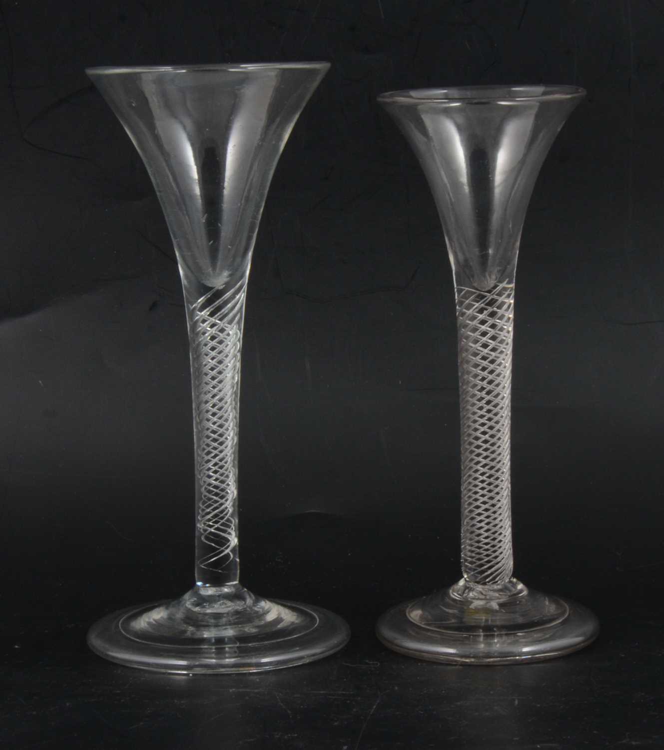 Lot 18 - Two trumpet shaped wine glasses