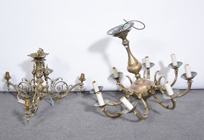 Lot 562 - Two brass chandeliers