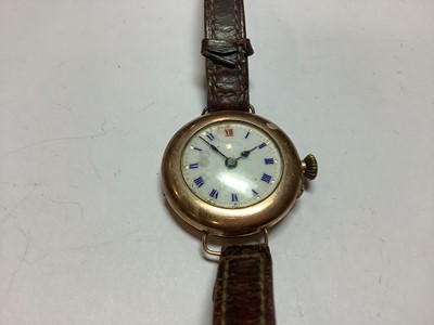Lot 305 - Tin of vintage costume jewellery.