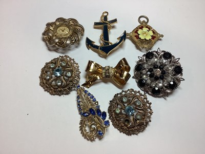 Lot 305 - Tin of vintage costume jewellery.