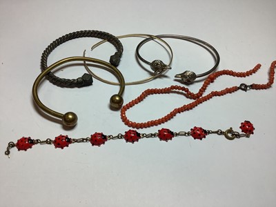 Lot 305 - Tin of vintage costume jewellery.
