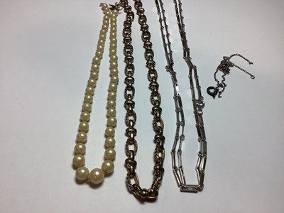 Lot 305 - Tin of vintage costume jewellery.