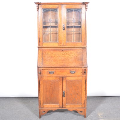 Lot 447 - An Edwardian bureau bookcase, in the Arts & Crafts style