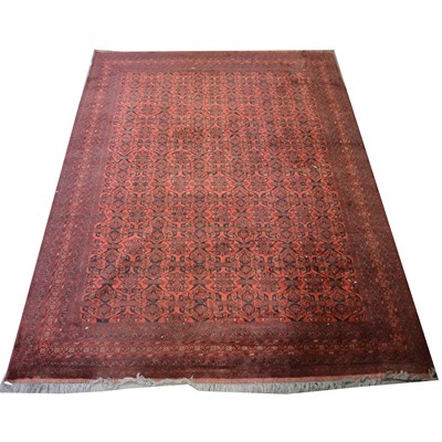 Lot 503 - A large Afghan pattern carpet