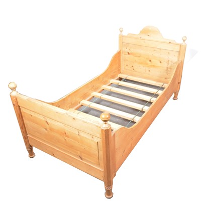 Lot 559 - A child's pine single sleigh bed.