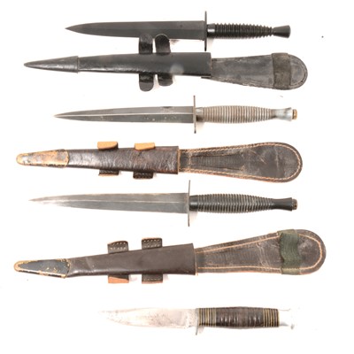 Lot 227 - Two "Fairbairn-Sykes" daggers, one replica dagger and a small knife
