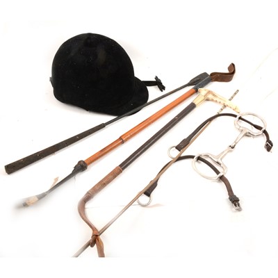 Lot 196 - Five riding crops, leather saddle, other horse tack