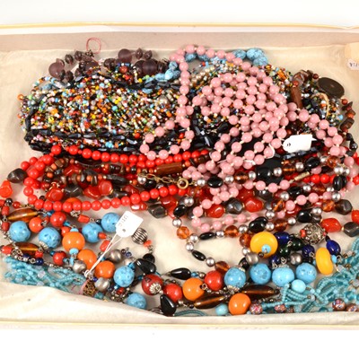 Lot 387 - Fourteen vintage bead necklaces, 1960's, 1970's