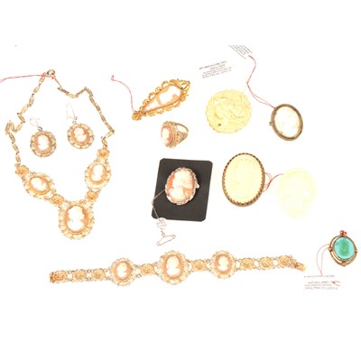 Lot 318 - A filigree gilt metal four part cameo parure, celluloid and glass cameos.