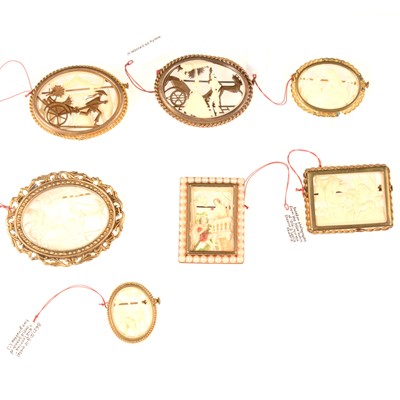 Lot 369 - Seven ivorine silhouette brooches in gilt metal mounts, some French.