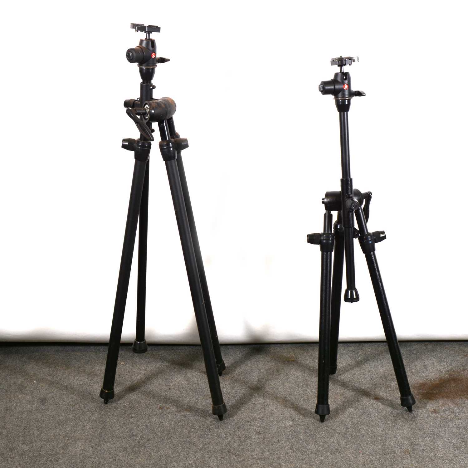 Lot 23 - Two Manfrotto 468MGRC2 ball heads, mounted on Benbo photography tri-pods.