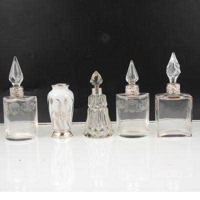 Lot 280 - Silver and white-metal topped bottles and other small silver.