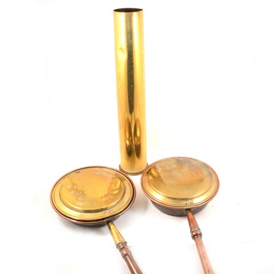 Lot 263 - Warming pans and a brass shell.