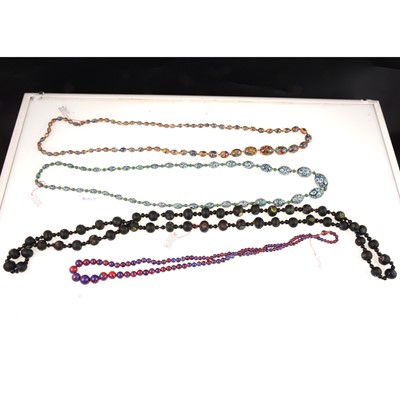 Lot 359 - Four vintage opaque glass bead necklaces, circa 1920/1930