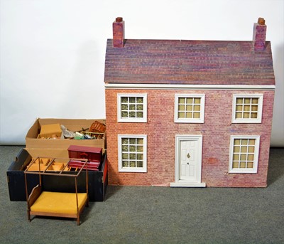 Lot 575 - Victorian townhouse style dolls house with furniture.