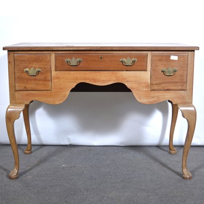 Lot 559 - Walnut dressing table